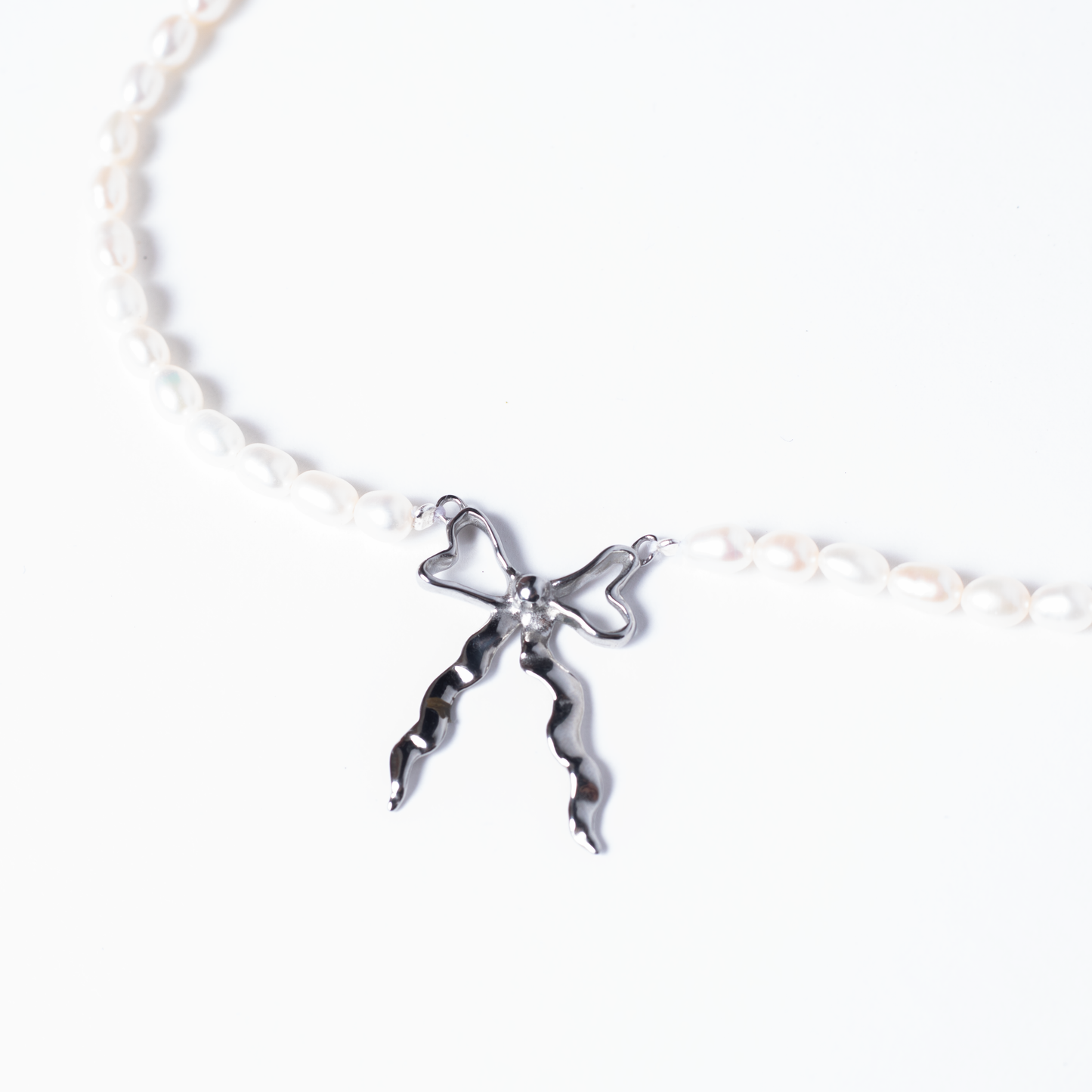 Small Steel bow with Freshwater Pearl chain Necklace